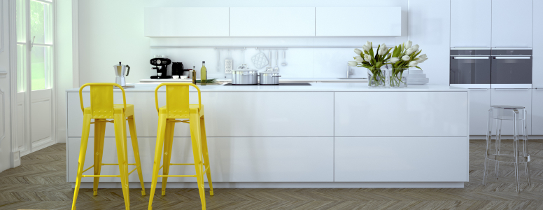 modern white interior kitchen with two yellow stools